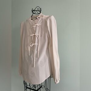 BCBG Max Azria Silk  long sleeve blouse with asymmetrical closure in off white